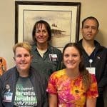 Group photo of nurses and staff members at Virginia Gay Hospital, celebrating lab week