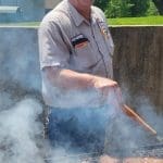 Rick Lazenby man grilling hamburgers