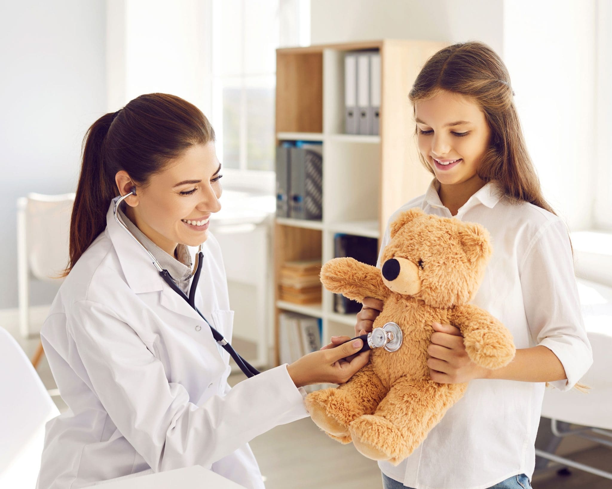 AdobeStock_477989788-web Doctor and young patient