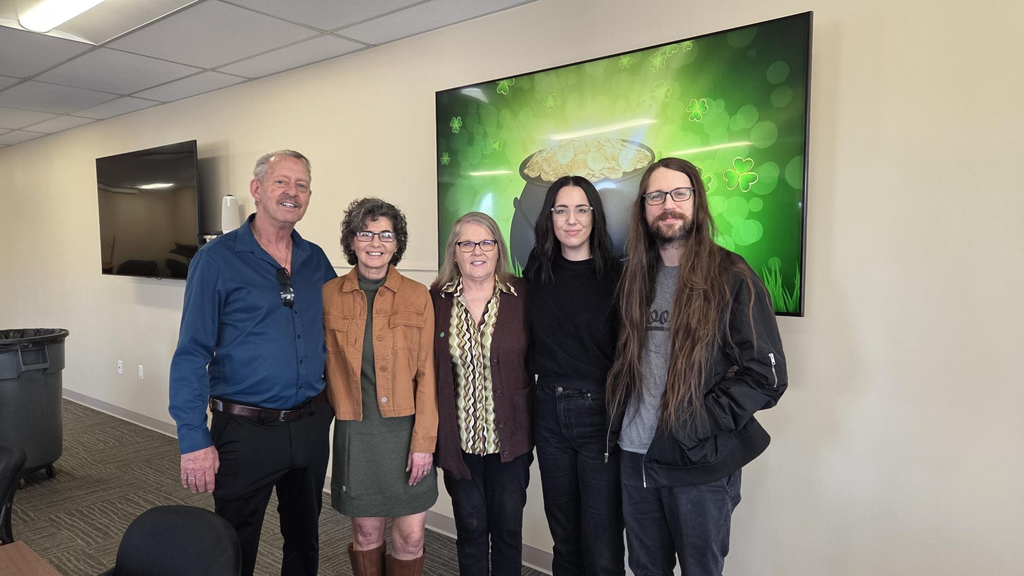 Retirement of Monica Starks After 38 Years of Service, group of people smiling at camera